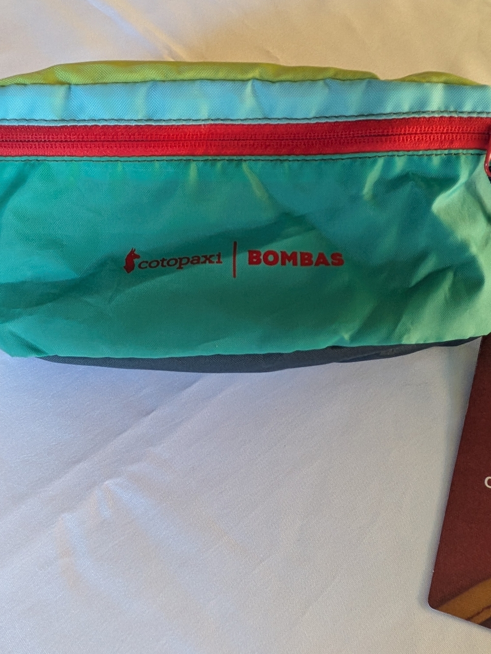 Cotopaxi x Bombas Teal & Lime Waist Pack